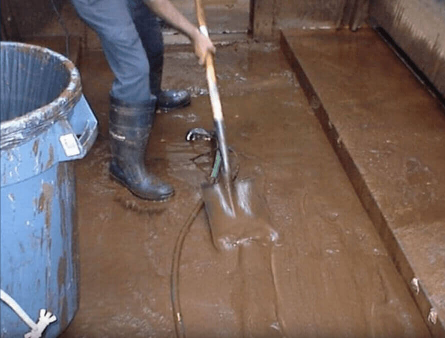 Cooling tower sludge cleaning